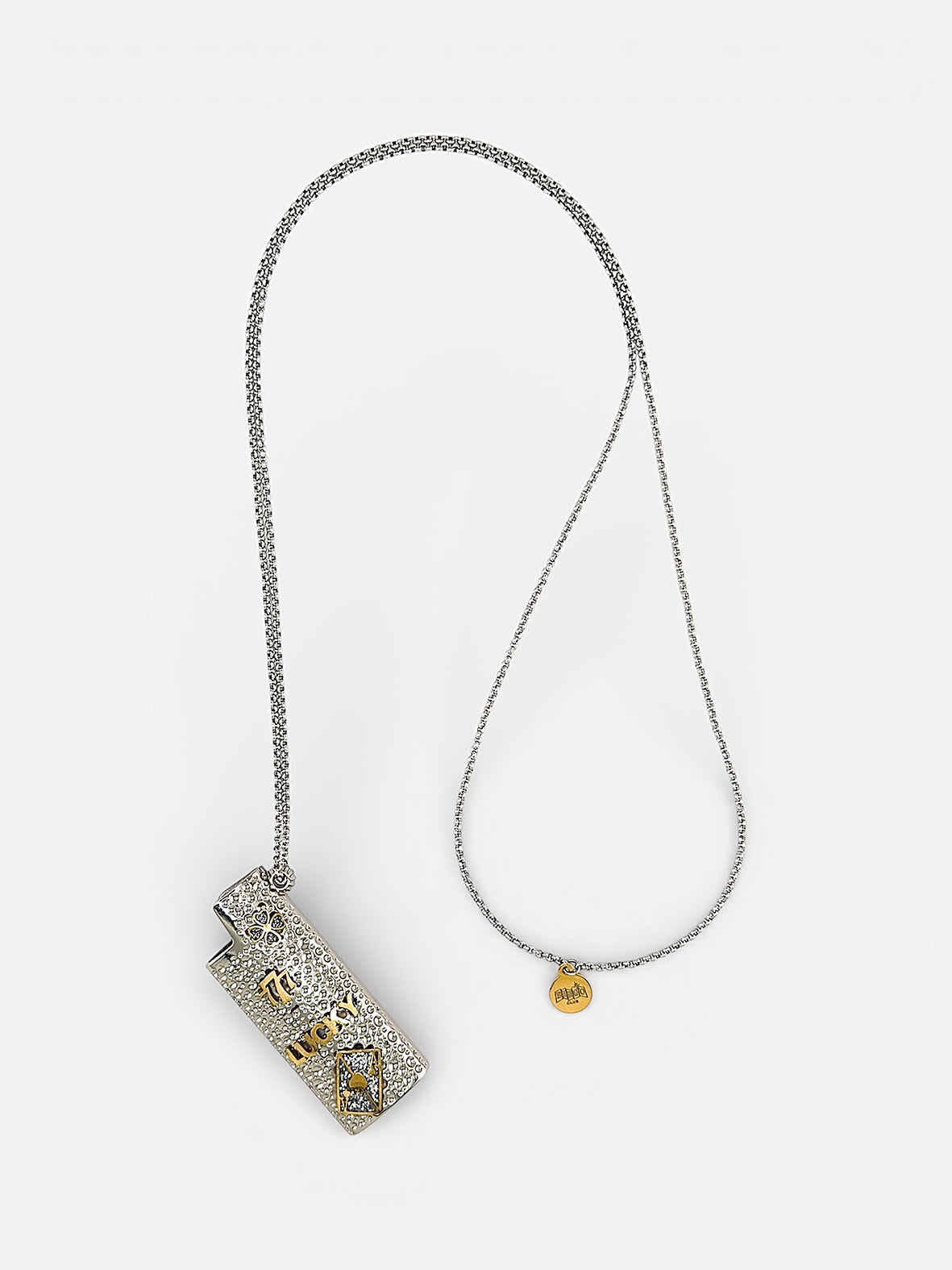 Détail cache-briquet ornemental grigris porte-bonheur acier inoxydable Bingo Club