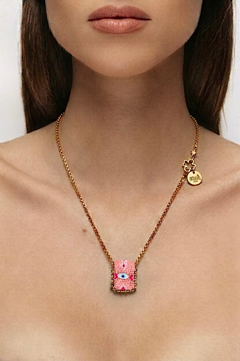 Collier œil porte-bonheur Bingo Ojo Flamingo, tissage rose poudré, œil en nacre, chaîne acier inoxydable doré, fait main