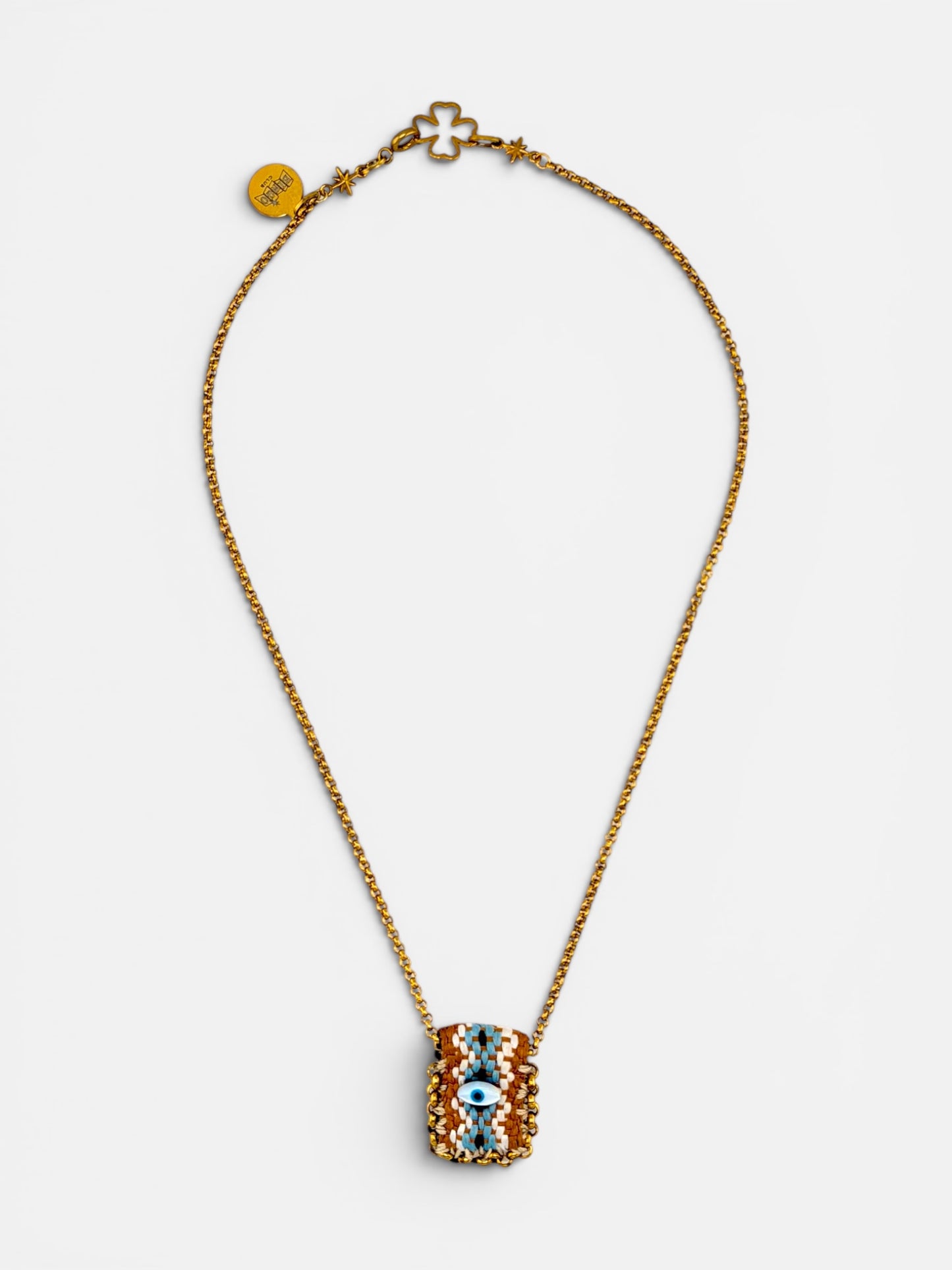 Collier œil porte-bonheur Bingo Ojo Rio Sunset, tissage terre gris et bleu ciel , œil en nacre, chaîne acier inoxydable doré, fait main